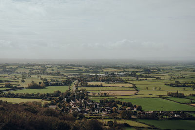 Scenic view of village and farms from mendip hills, uk, on a sunny autumn day.