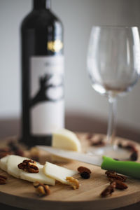 Close-up of wine bottles on table