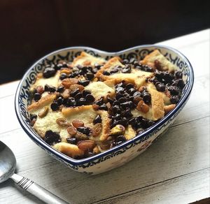 High angle view of breakfast in heart shape bowl on table