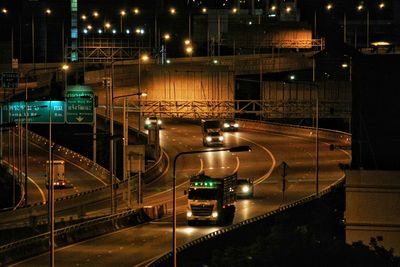 Traffic on road in city at night