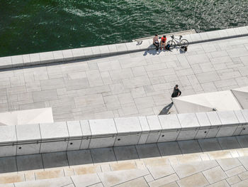 High angle view of people on swimming pool