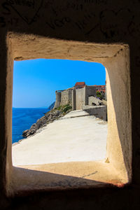 Buildings seen through window