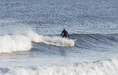 Man surfing in sea