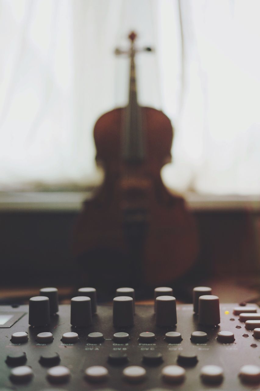 CLOSE-UP OF KEYBOARD ON STAGE