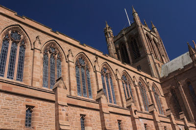 Low angle view of ornate building against sky