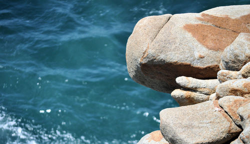 Close-up of rock in sea