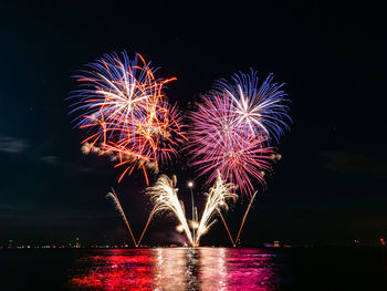 Firework display at night