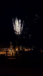 Firework display at night