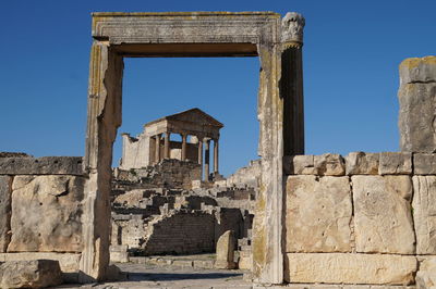 Low angle view of old ruin building against sky