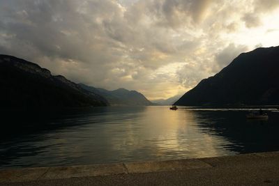 Scenic view of lake against sky during sunset