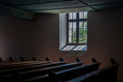 Low angle view of empty glass window of building
