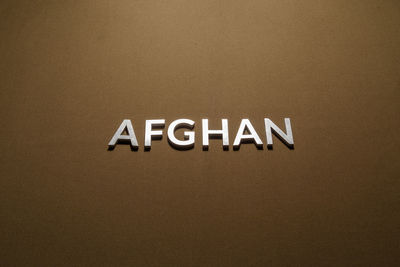 Close-up of text on wall