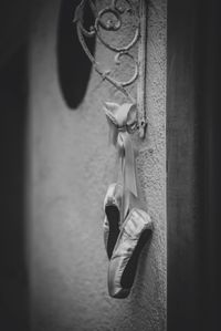 Close-up of clothes hanging on wall