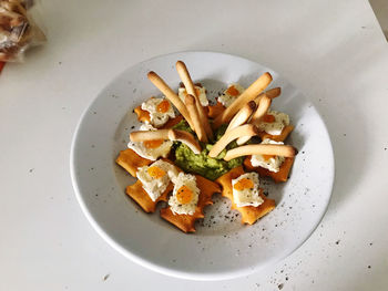 High angle view of fruit salad in plate on table