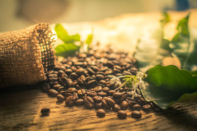 Close-up of coffee beans on table