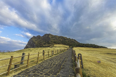 Scenic view of land against sky