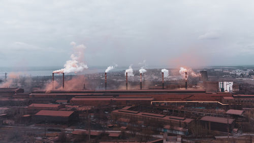 A chimney chemical plant in the discharge of pollutants, industry pipes pollute the atmosphere smoke