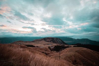 Scenic view of landscape against sky during sunset