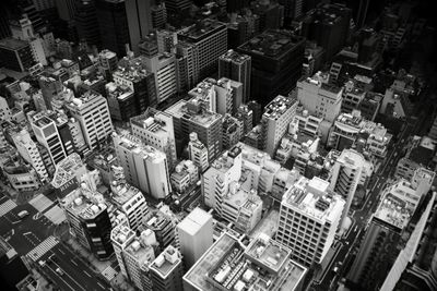 High angle view of buildings in city at night