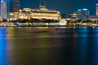 Illuminated buildings at waterfront