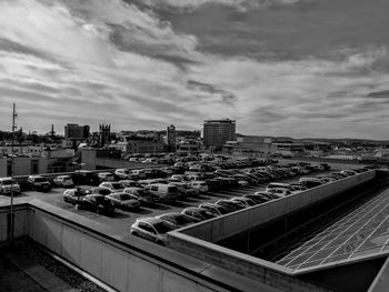 High angle view of city against cloudy sky