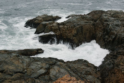 Scenic view of rocks in sea