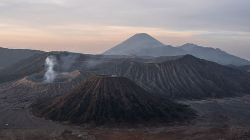 Scenic view of mountains against sky during sunset