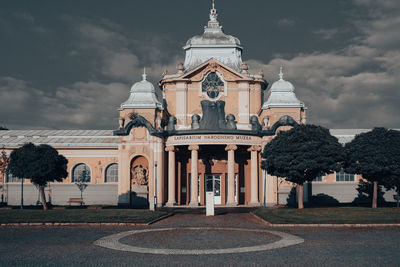 Exterior of historic building against sky