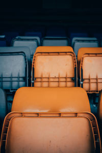 Empty chairs in stadium