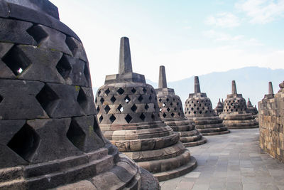 Panoramic view of temple against building