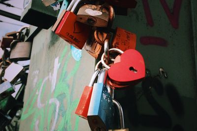 Close-up of padlocks on railing