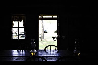 View of glass of table through window