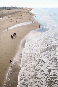 Panoramic view of people on beach