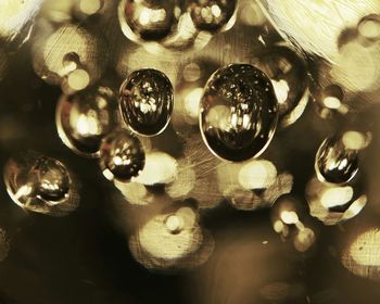 Close-up of wine glasses on table