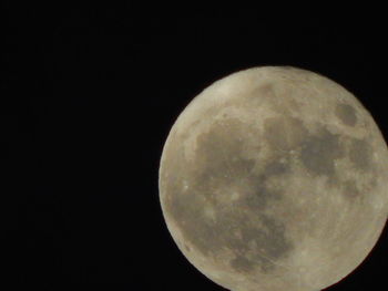 Scenic view of moon against clear sky at night