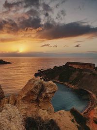 Scenic view of sea against sky during sunset