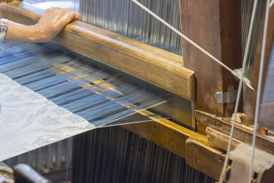 Close-up of woman working in factory