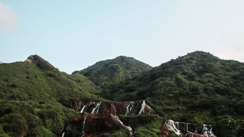 Low angle view of mountains against clear sky