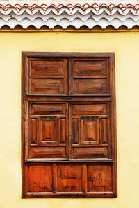 Closed wooden door of house