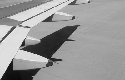 High angle view of airplane on airport runway