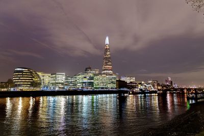 Illuminated buildings in city at night