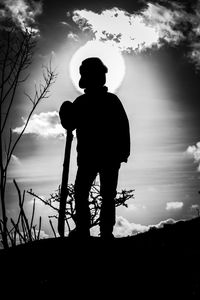 Low angle view of silhouette trees against sky at sunset