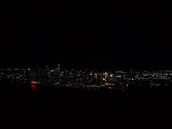 Illuminated cityscape at night