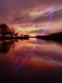 Scenic reflection of clouds in calm lake