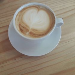 High angle view of cappuccino on table