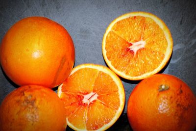 Close-up of oranges against orange background