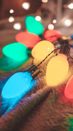 Close-up of illuminated lighting equipment on table