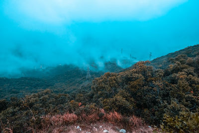 Smoke emitting from volcanic mountain