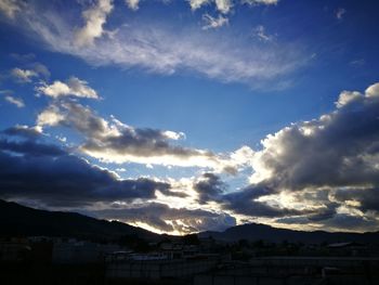 Scenic view of silhouette mountains against sky