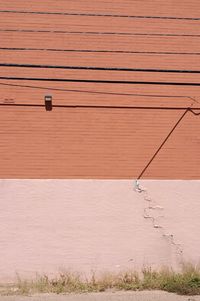 High angle view of telephone pole on wall